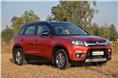 With its short overhangs, squared-out wheel arches and mildly raked tail, the Vitara Brezza looks like a scaled-down SUV.